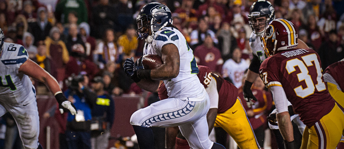 Marshawn Lynch runs versus the Washington Redskins in a Wild Card matchup