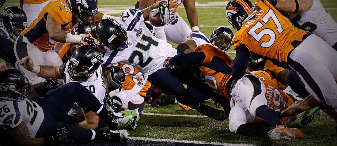 Marshawn Lynch dives into the end zone, scoring a touchdown versus the Denver Broncos in Super Bowl 48